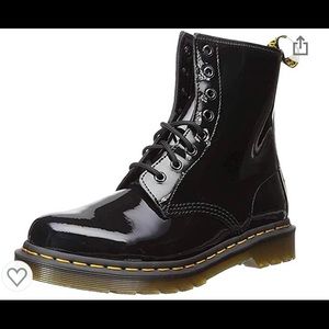 New without tags Dr. Martens black patent boots.